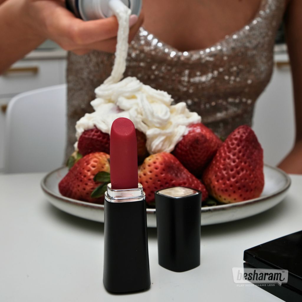 Lipstick Vibe 2.0 styled on a table with strawberries and whipped cream
